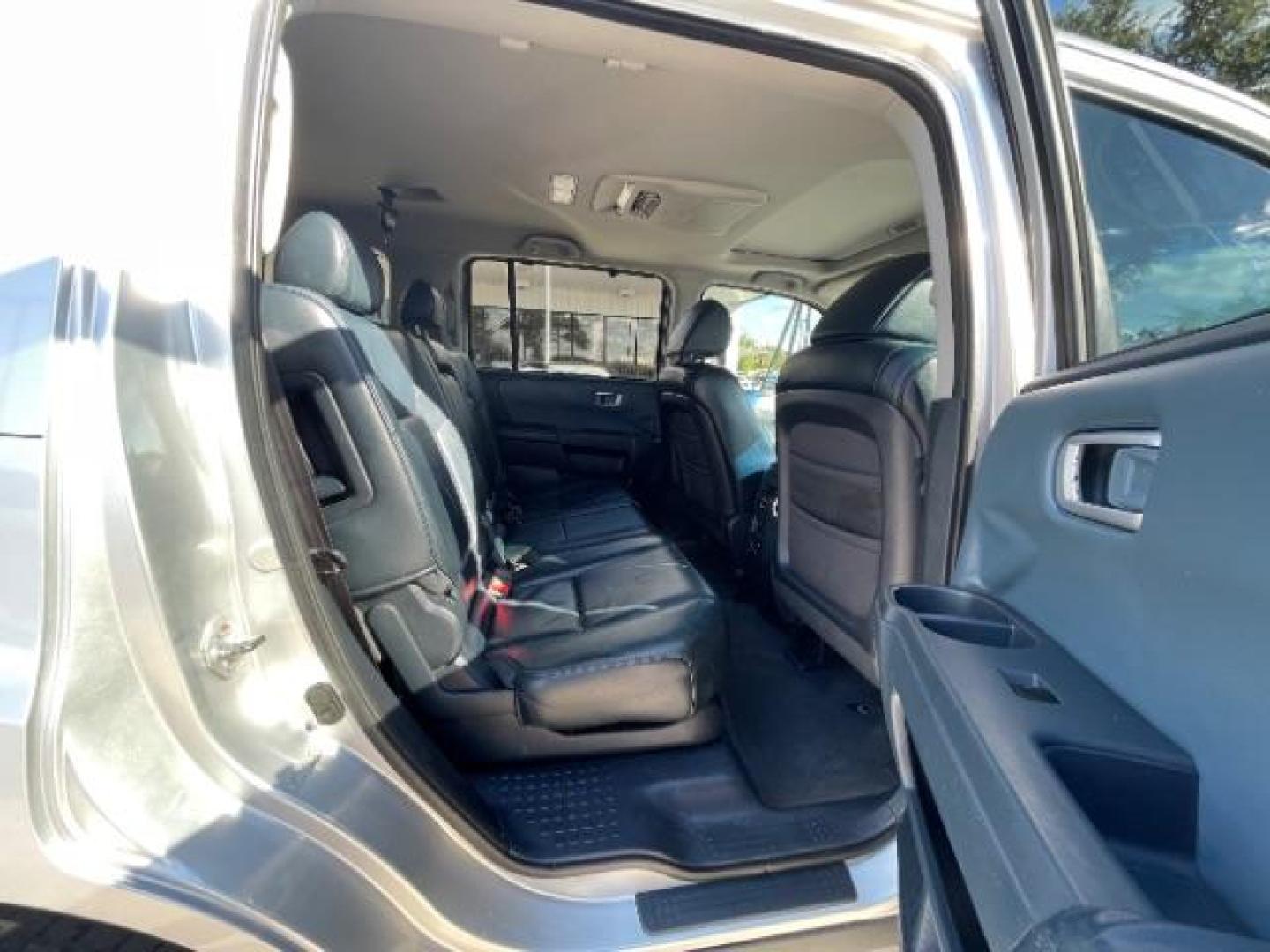 2009 Silver /Black Leather Interi Honda Pilot Touring 2WD with DVD (5FNYF38959B) with an 3.5L V6 SOHC 24V engine, 5-Speed Automatic transmission, located at 900 South McDonald Street, McKinney, TX, 75069, (972) 529-2992, 33.189335, -96.613403 - Photo#11