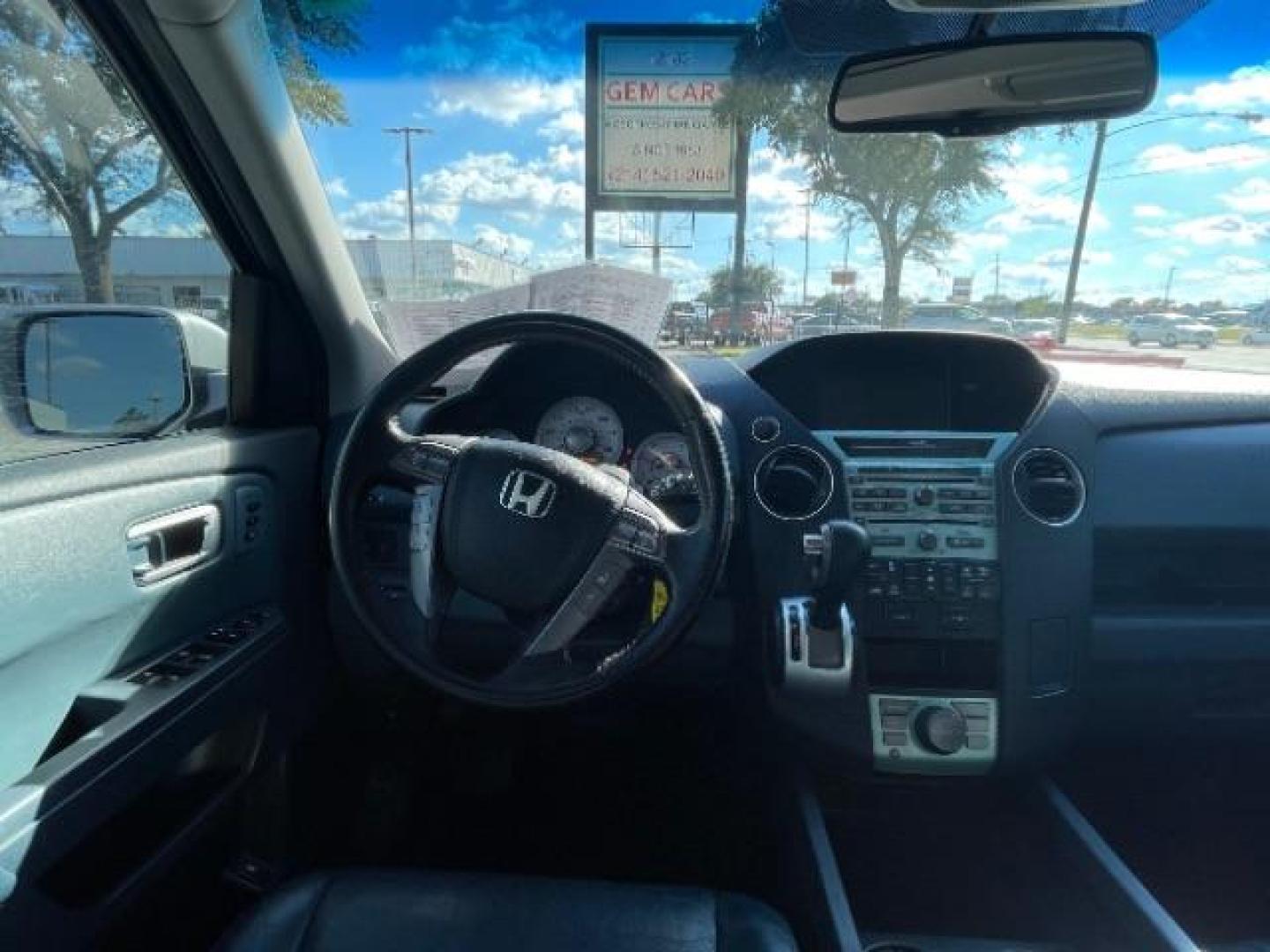 2009 Silver /Black Leather Interi Honda Pilot Touring 2WD with DVD (5FNYF38959B) with an 3.5L V6 SOHC 24V engine, 5-Speed Automatic transmission, located at 900 South McDonald Street, McKinney, TX, 75069, (972) 529-2992, 33.189335, -96.613403 - Photo#14