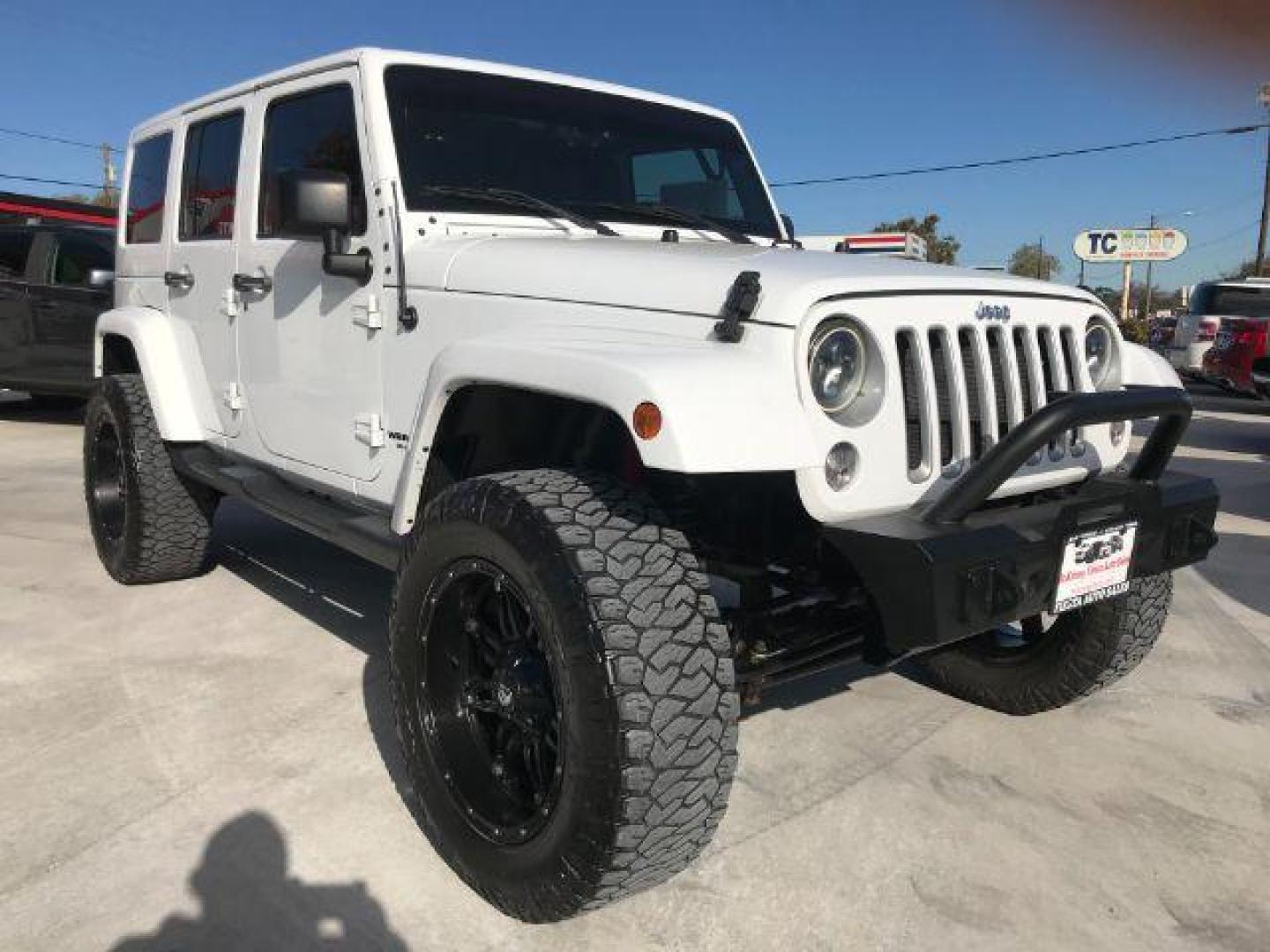 2016 Bright White Clear Coat /Black, leather Jeep Wrangler Unlimited Sahara 4WD (1C4BJWEG3GL) with an 3.6L V6 DOHC 24V FFV engine, located at 900 South McDonald Street, McKinney, TX, 75069, (972) 529-2992, 33.189335, -96.613403 - Photo#1