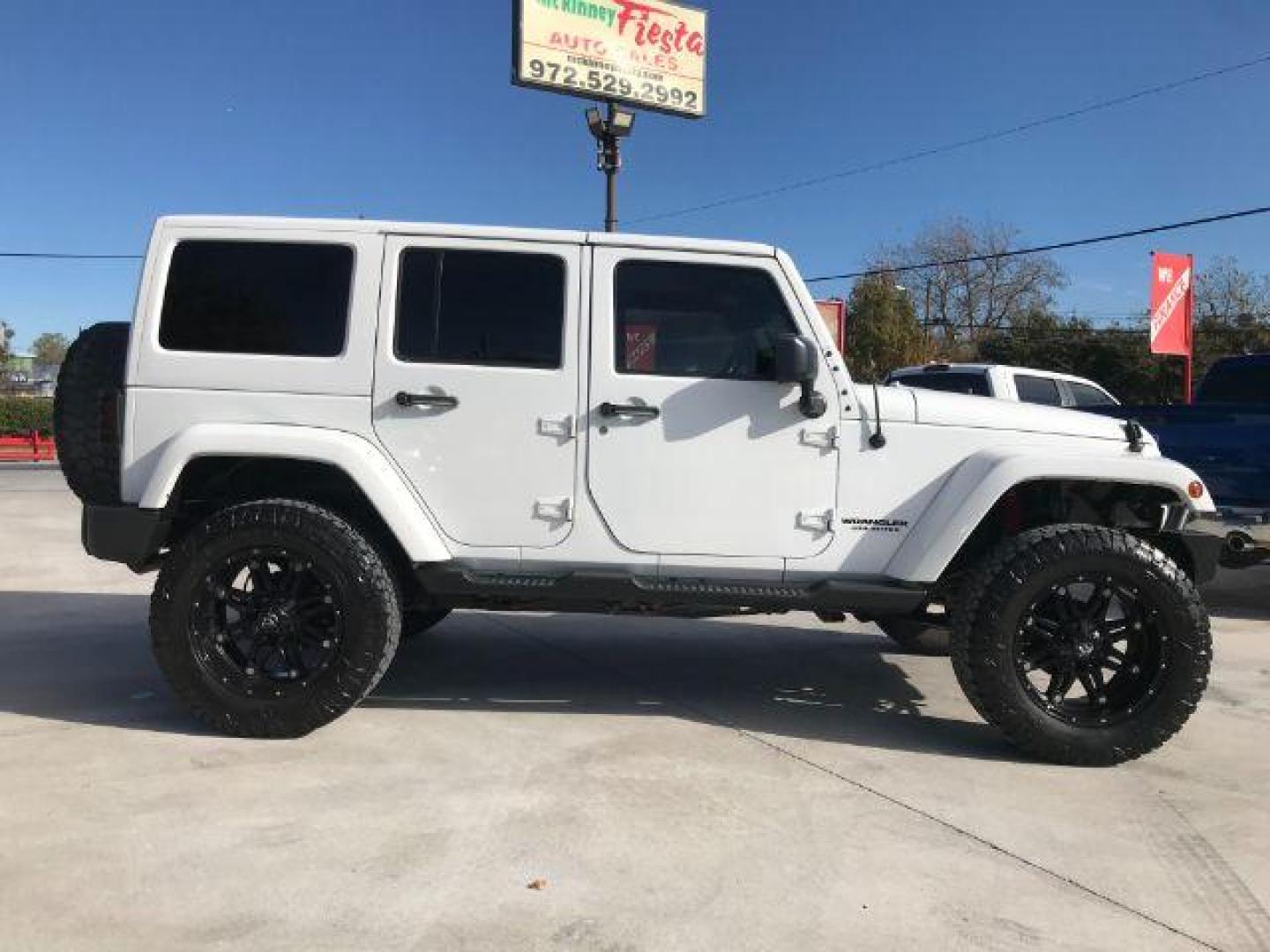 2016 Bright White Clear Coat /Black, leather Jeep Wrangler Unlimited Sahara 4WD (1C4BJWEG3GL) with an 3.6L V6 DOHC 24V FFV engine, located at 900 South McDonald Street, McKinney, TX, 75069, (972) 529-2992, 33.189335, -96.613403 - Photo#2