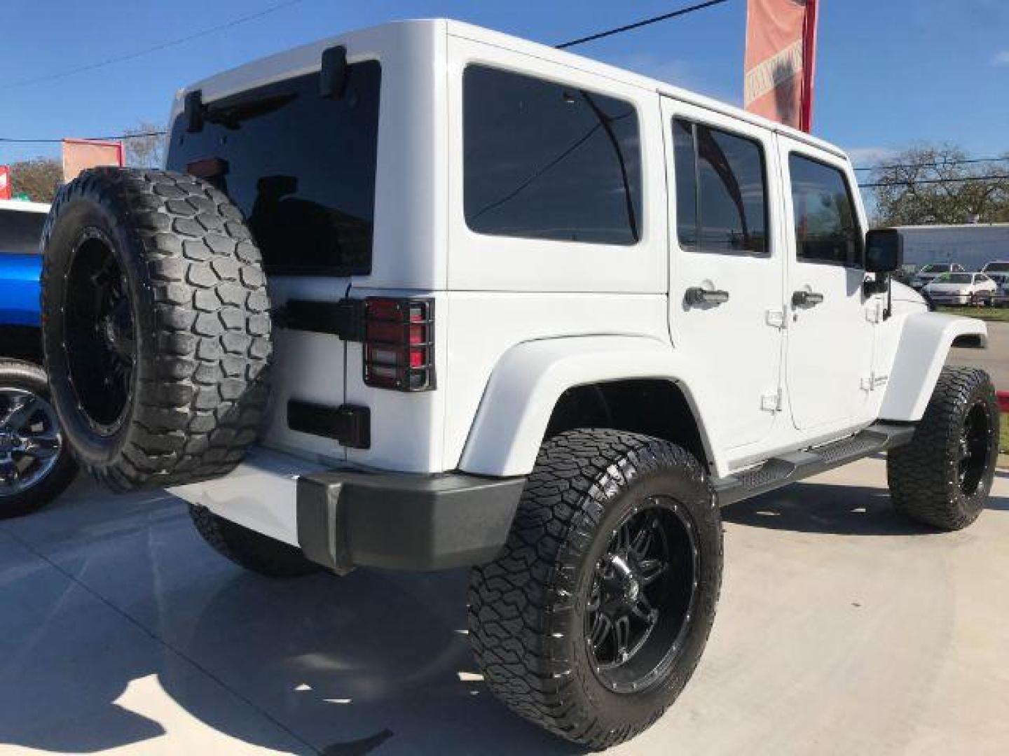 2016 Bright White Clear Coat /Black, leather Jeep Wrangler Unlimited Sahara 4WD (1C4BJWEG3GL) with an 3.6L V6 DOHC 24V FFV engine, located at 900 South McDonald Street, McKinney, TX, 75069, (972) 529-2992, 33.189335, -96.613403 - Photo#3