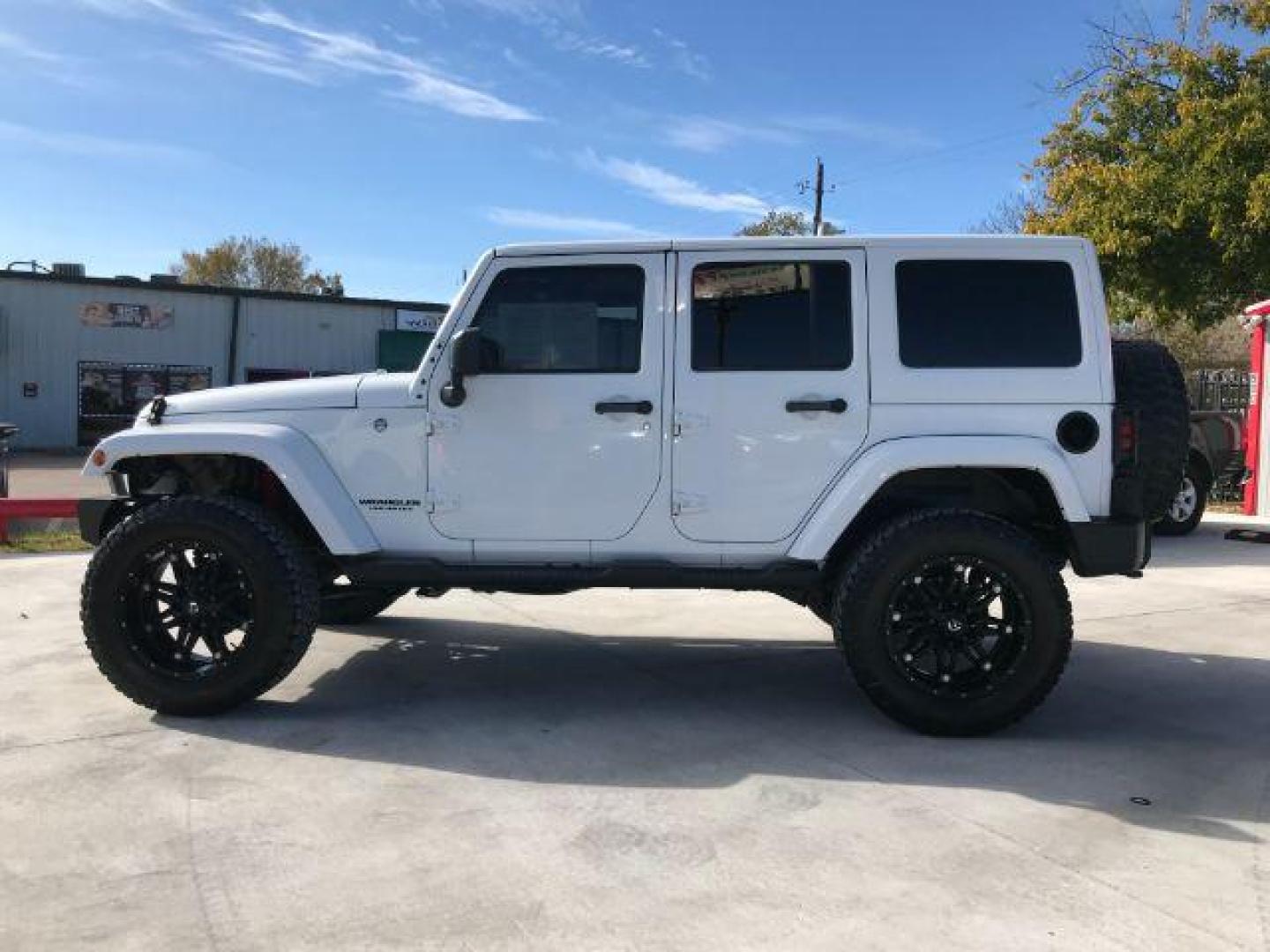 2016 Bright White Clear Coat /Black, leather Jeep Wrangler Unlimited Sahara 4WD (1C4BJWEG3GL) with an 3.6L V6 DOHC 24V FFV engine, located at 900 South McDonald Street, McKinney, TX, 75069, (972) 529-2992, 33.189335, -96.613403 - Photo#6