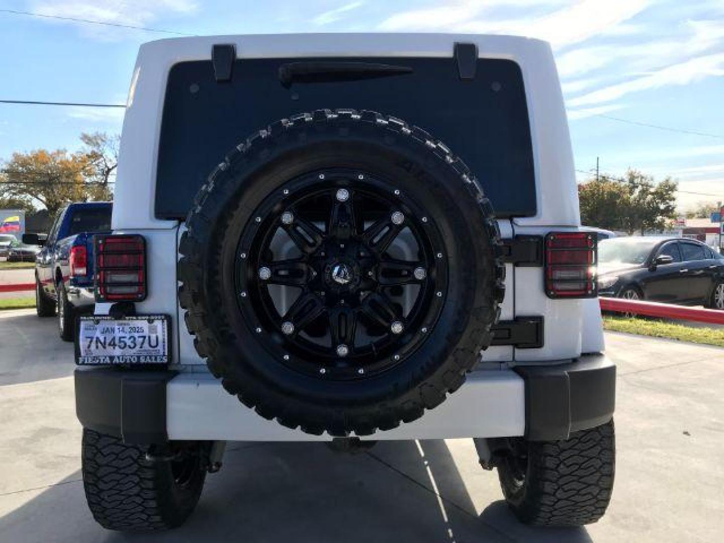 2016 Bright White Clear Coat /Black, leather Jeep Wrangler Unlimited Sahara 4WD (1C4BJWEG3GL) with an 3.6L V6 DOHC 24V FFV engine, located at 900 South McDonald Street, McKinney, TX, 75069, (972) 529-2992, 33.189335, -96.613403 - Photo#7