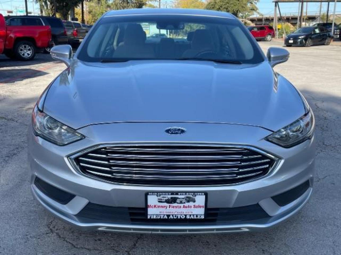 2018 Ingot Silver Metalli /Medium Light Stone, Ford Fusion SE (3FA6P0H79JR) with an 2.5L L4 DOHC 16V engine, 6-Speed Automatic transmission, located at 900 South McDonald Street, McKinney, TX, 75069, (972) 529-2992, 33.189335, -96.613403 - Photo#3