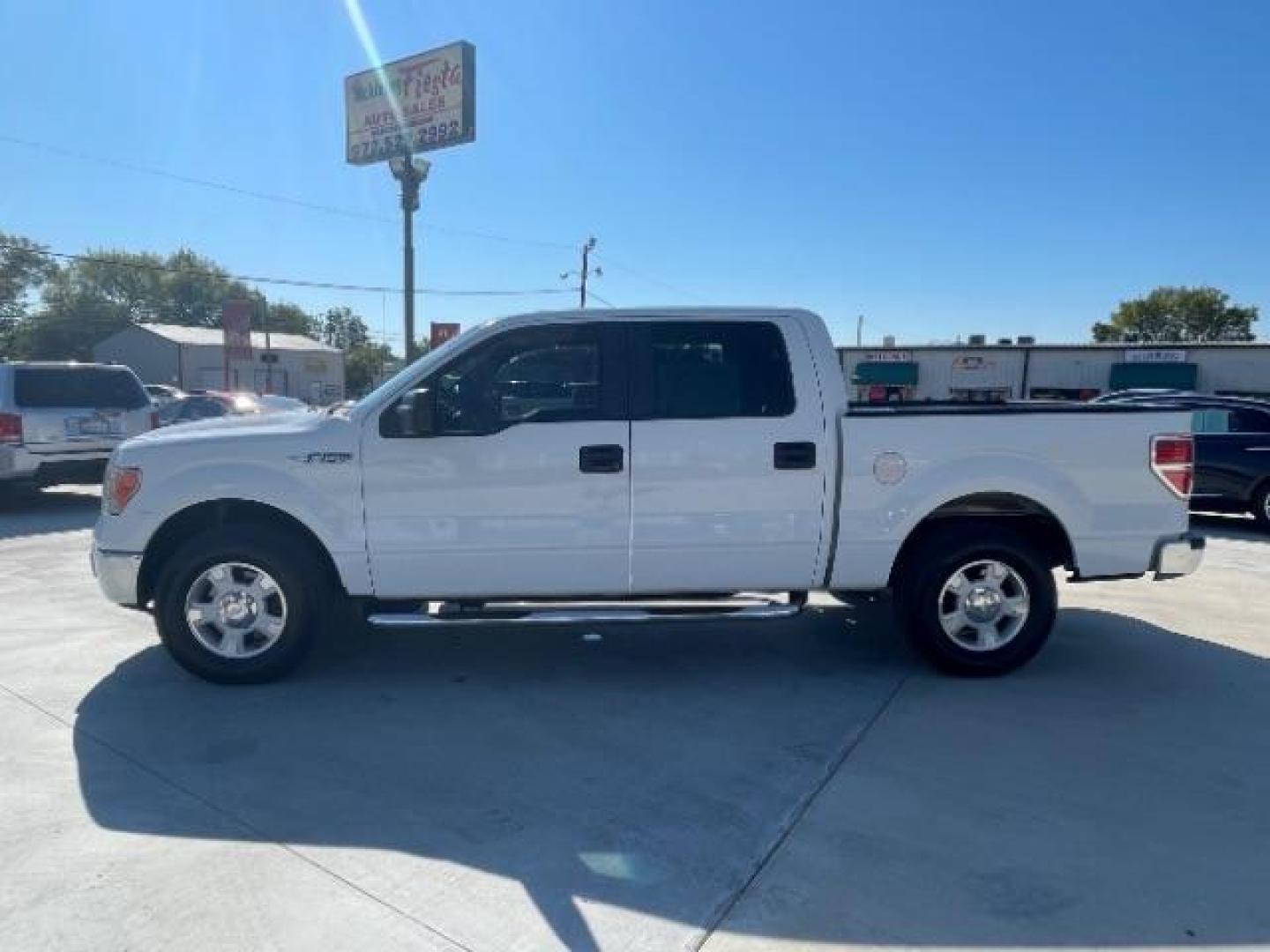 2010 Oxford White /Tan Cloth Interior Ford F-150 XLT SuperCrew 5.5-ft (1FTEW1C89AF) with an 4.6L V8 SOHC 24V engine, located at 900 South McDonald Street, McKinney, TX, 75069, (972) 529-2992, 33.189335, -96.613403 - Photo#3