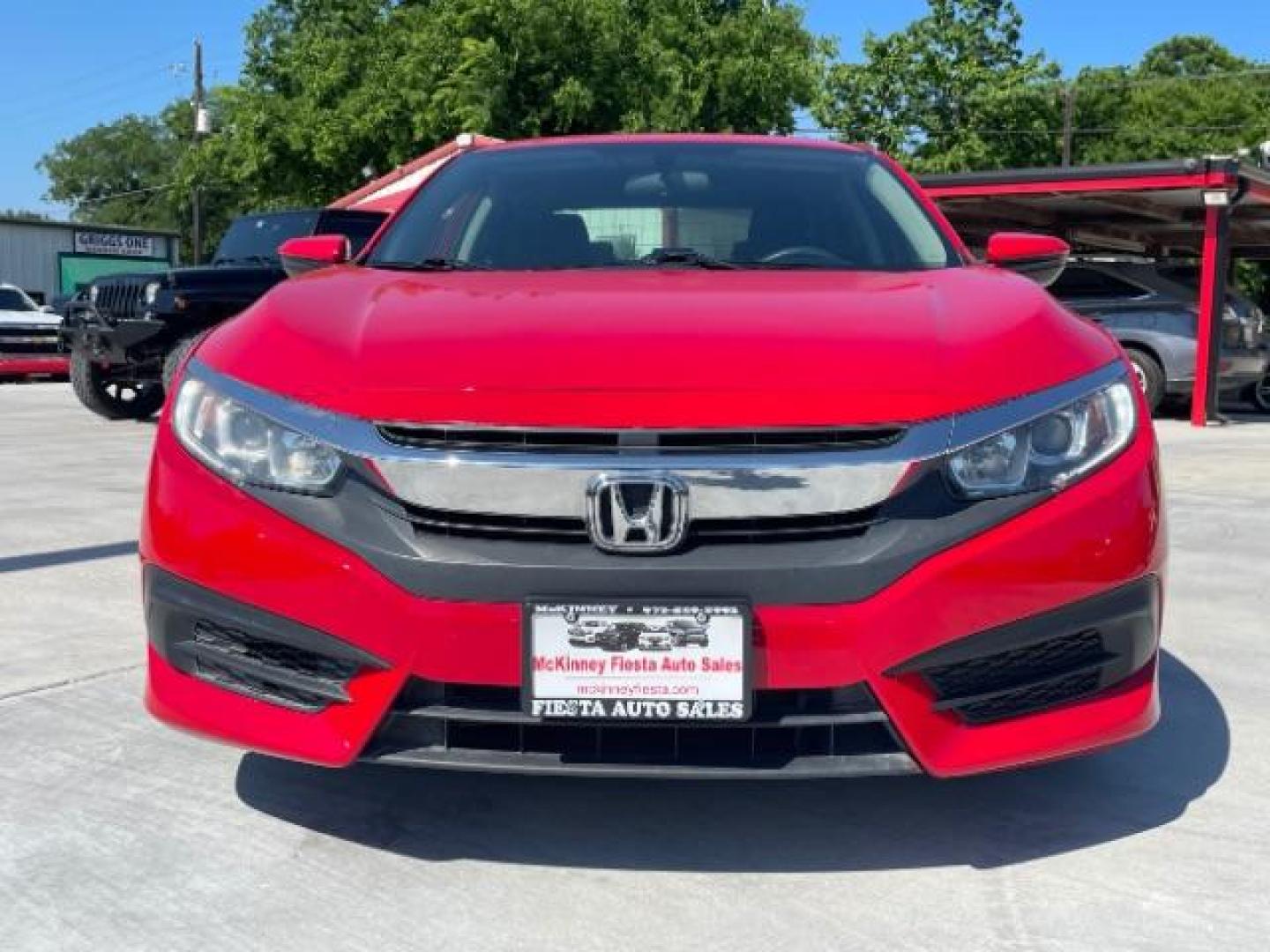 2017 Rallye Red /Black, cloth Honda Civic LX Sedan CVT (2HGFC2F57HH) with an 2.0L L4 DOHC 16V engine, Continuously Variable Transmission transmission, located at 900 South McDonald Street, McKinney, TX, 75069, (972) 529-2992, 33.189335, -96.613403 - Photo#1