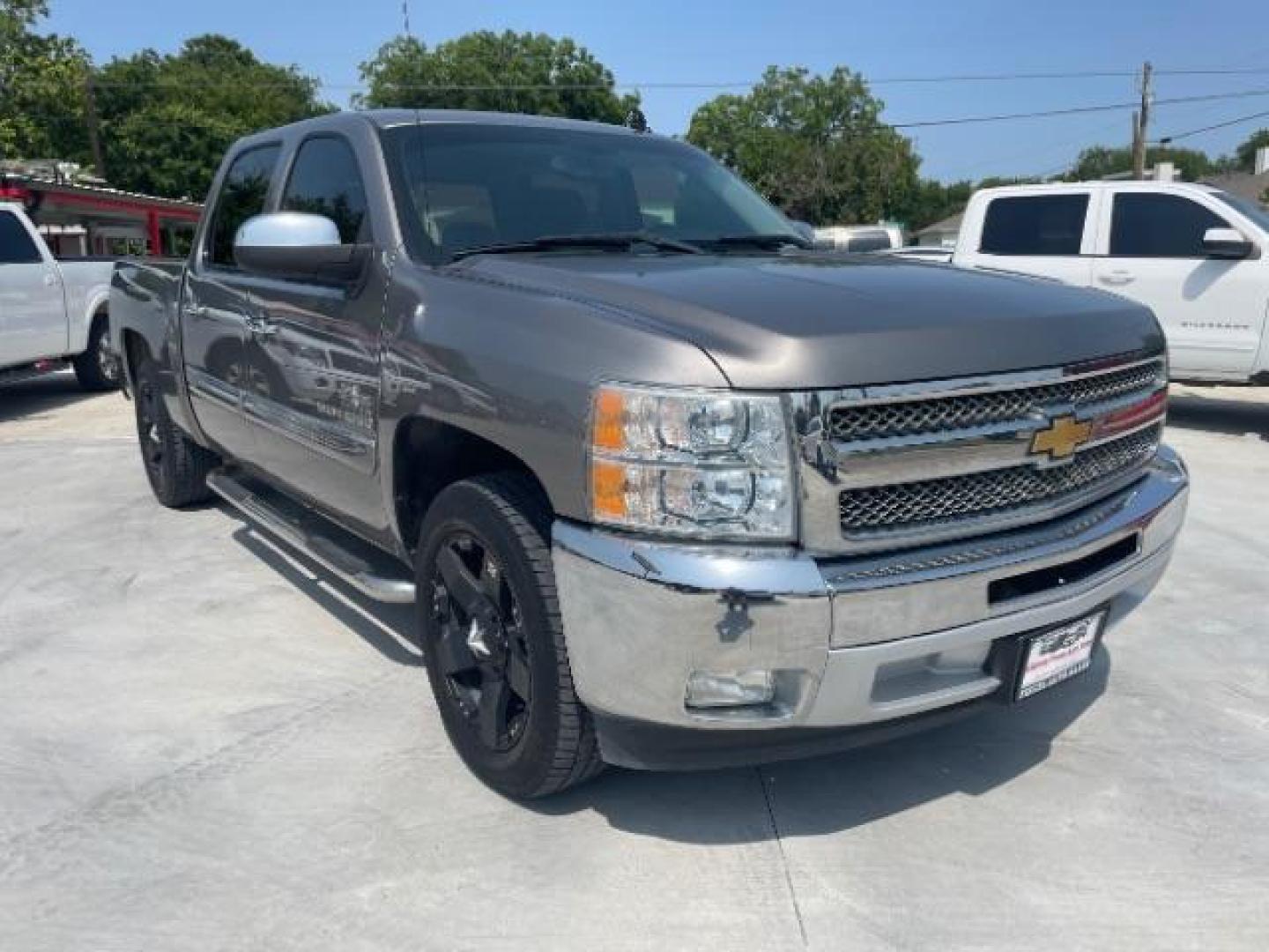 2012 Silver Ice Metallic /Ebony Cloth Interior Chevrolet Silverado 1500 LT Crew Cab 2WD (3GCPCSE09CG) with an 5.3L V8 OHV 16V FFV engine, 6-Speed Automatic transmission, located at 900 South McDonald Street, McKinney, TX, 75069, (972) 529-2992, 33.189335, -96.613403 - Photo#1