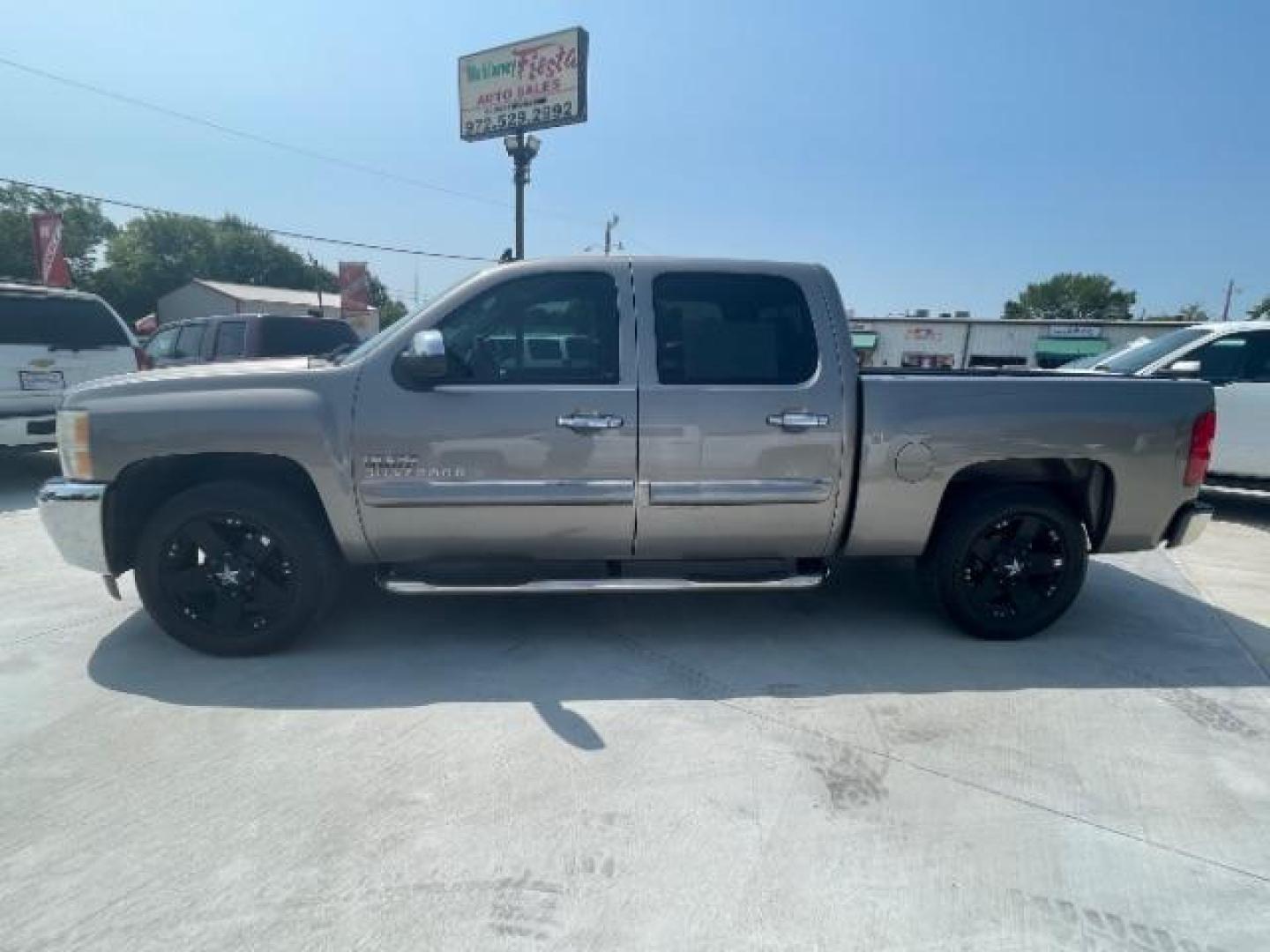 2012 Silver Ice Metallic /Ebony Cloth Interior Chevrolet Silverado 1500 LT Crew Cab 2WD (3GCPCSE09CG) with an 5.3L V8 OHV 16V FFV engine, 6-Speed Automatic transmission, located at 900 South McDonald Street, McKinney, TX, 75069, (972) 529-2992, 33.189335, -96.613403 - Photo#2