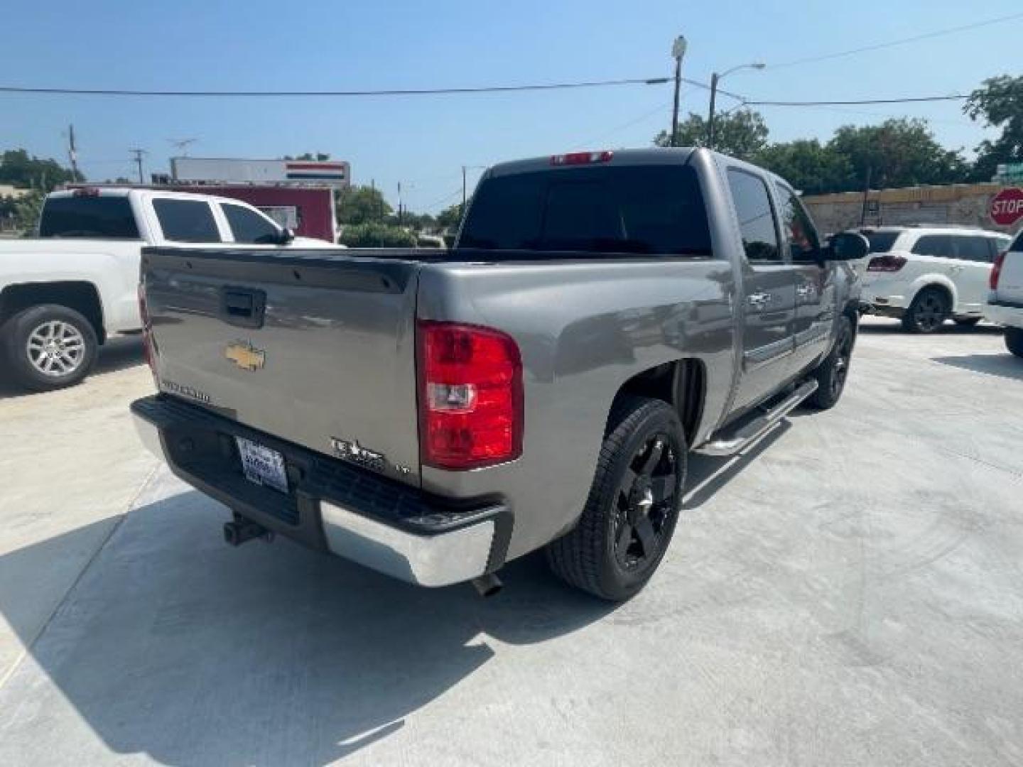 2012 Silver Ice Metallic /Ebony Cloth Interior Chevrolet Silverado 1500 LT Crew Cab 2WD (3GCPCSE09CG) with an 5.3L V8 OHV 16V FFV engine, 6-Speed Automatic transmission, located at 900 South McDonald Street, McKinney, TX, 75069, (972) 529-2992, 33.189335, -96.613403 - Photo#5