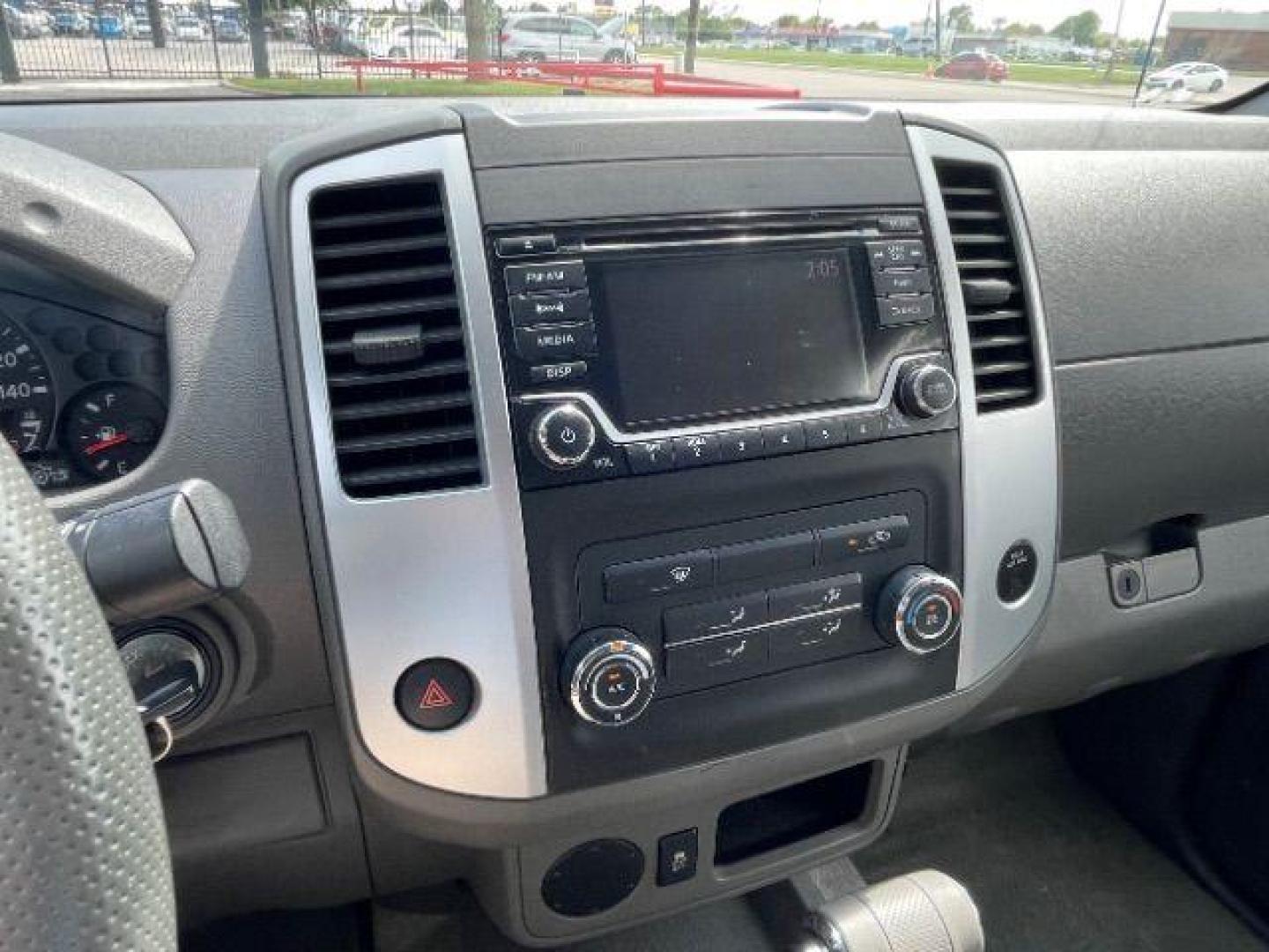 2016 Gun Metallic /Black cloth Nissan Frontier SL Crew Cab 5AT 2WD (1N6AD0ER2GN) with an 4.0L V6 DOHC 24V engine, 5-Speed Automatic transmission, located at 900 South McDonald Street, McKinney, TX, 75069, (972) 529-2992, 33.189335, -96.613403 - Photo#9