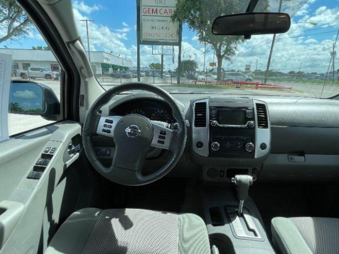 2016 Gun Metallic /Black cloth Nissan Frontier SL Crew Cab 5AT 2WD (1N6AD0ER2GN) with an 4.0L V6 DOHC 24V engine, 5-Speed Automatic transmission, located at 900 South McDonald Street, McKinney, TX, 75069, (972) 529-2992, 33.189335, -96.613403 - Photo#14