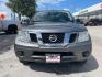 2016 Gun Metallic /Black cloth Nissan Frontier SL Crew Cab 5AT 2WD (1N6AD0ER2GN) with an 4.0L V6 DOHC 24V engine, 5-Speed Automatic transmission, located at 900 South McDonald Street, McKinney, TX, 75069, (972) 529-2992, 33.189335, -96.613403 - Photo#1