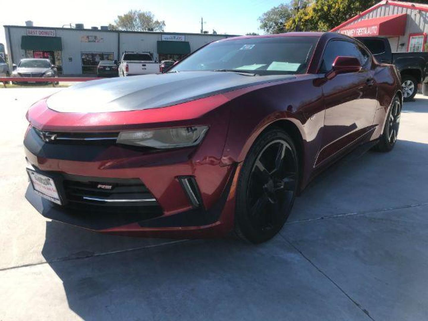 2017 Garnet Red Tintcoat /Jet Black, cloth Chevrolet Camaro 1LT Coupe (1G1FB1RSXH0) with an 3.6L V6 DOHC 24V engine, 6-Speed Automatic transmission, located at 900 South McDonald Street, McKinney, TX, 75069, (972) 529-2992, 33.189335, -96.613403 - Photo#0