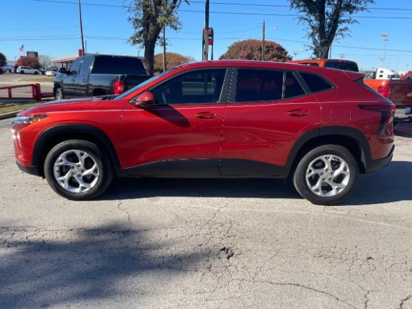 2024 Cayenne Orange Metallic Chevrolet Trax LS (KL77LFE29RC) with an 1.2L L3 TURBO engine, 6-Speed Automatic transmission, located at 900 South McDonald Street, McKinney, TX, 75069, (972) 529-2992, 33.189335, -96.613403 - Photo#3