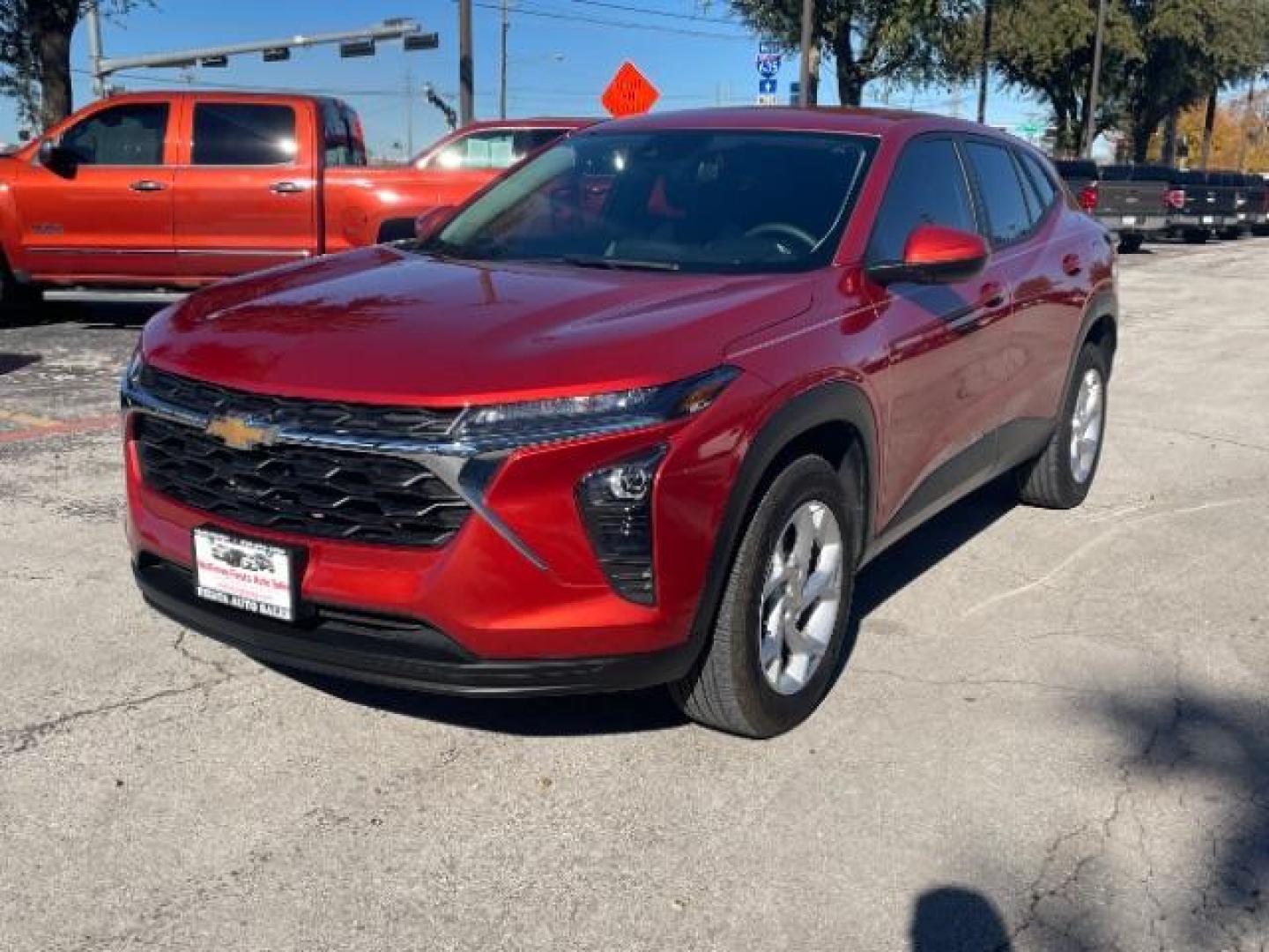 2024 Cayenne Orange Metallic Chevrolet Trax LS (KL77LFE29RC) with an 1.2L L3 TURBO engine, 6-Speed Automatic transmission, located at 900 South McDonald Street, McKinney, TX, 75069, (972) 529-2992, 33.189335, -96.613403 - Photo#4