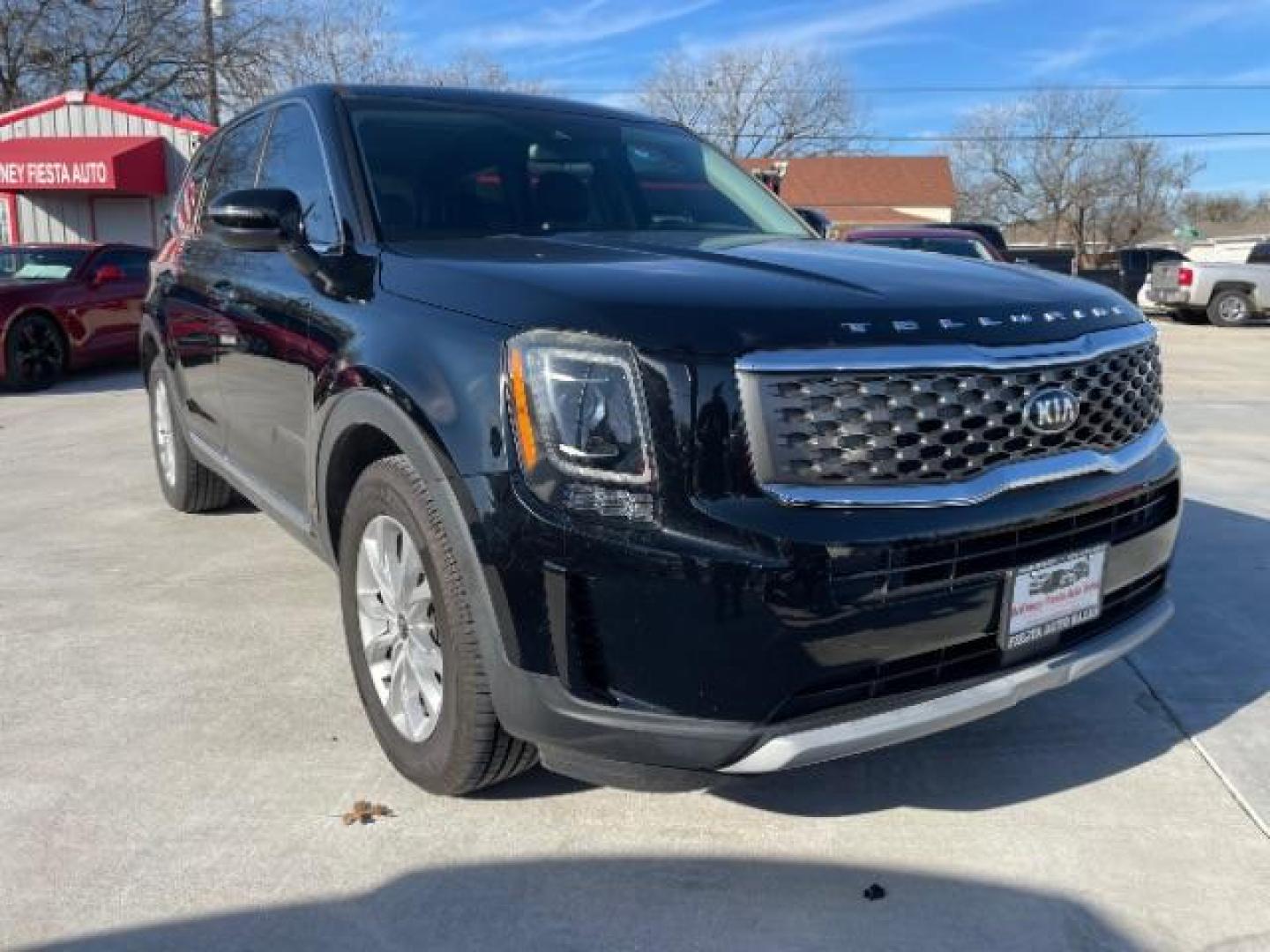 2020 Ebony Black /Black SOFINO, leatherette Kia Telluride LX (5XYP24HC6LG) with an 3.8L V6 DOHC 24V engine, 8-Speed Automatic transmission, located at 900 South McDonald Street, McKinney, TX, 75069, (972) 529-2992, 33.189335, -96.613403 - Photo#0