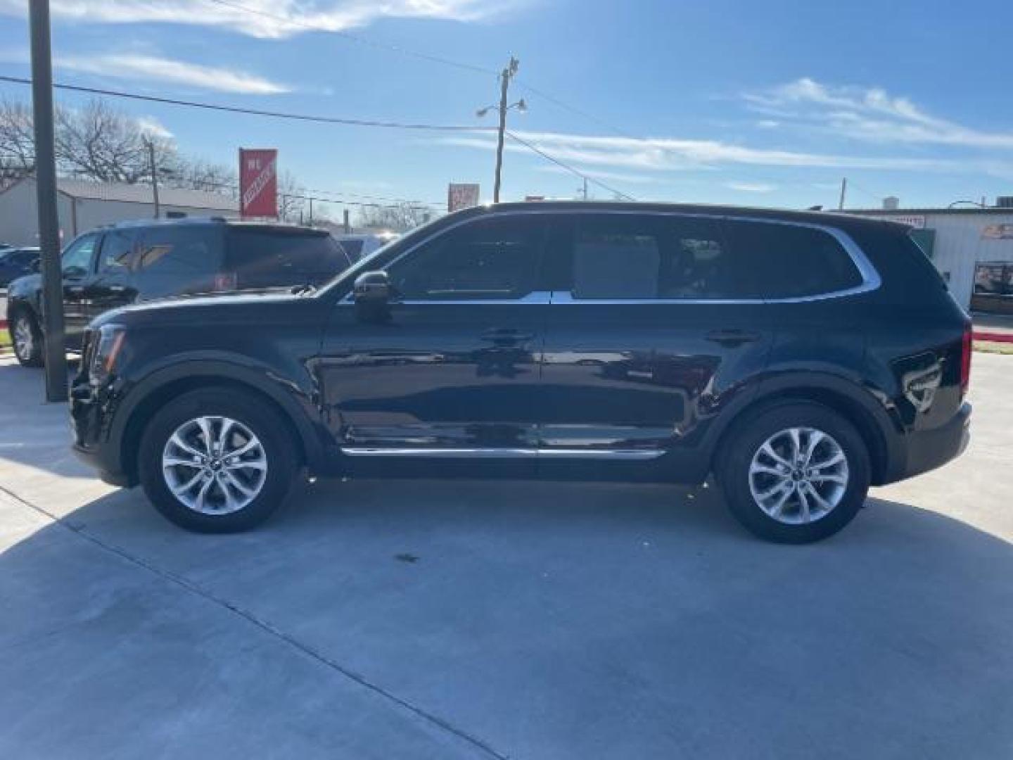 2020 Ebony Black /Black SOFINO, leatherette Kia Telluride LX (5XYP24HC6LG) with an 3.8L V6 DOHC 24V engine, 8-Speed Automatic transmission, located at 900 South McDonald Street, McKinney, TX, 75069, (972) 529-2992, 33.189335, -96.613403 - Photo#1