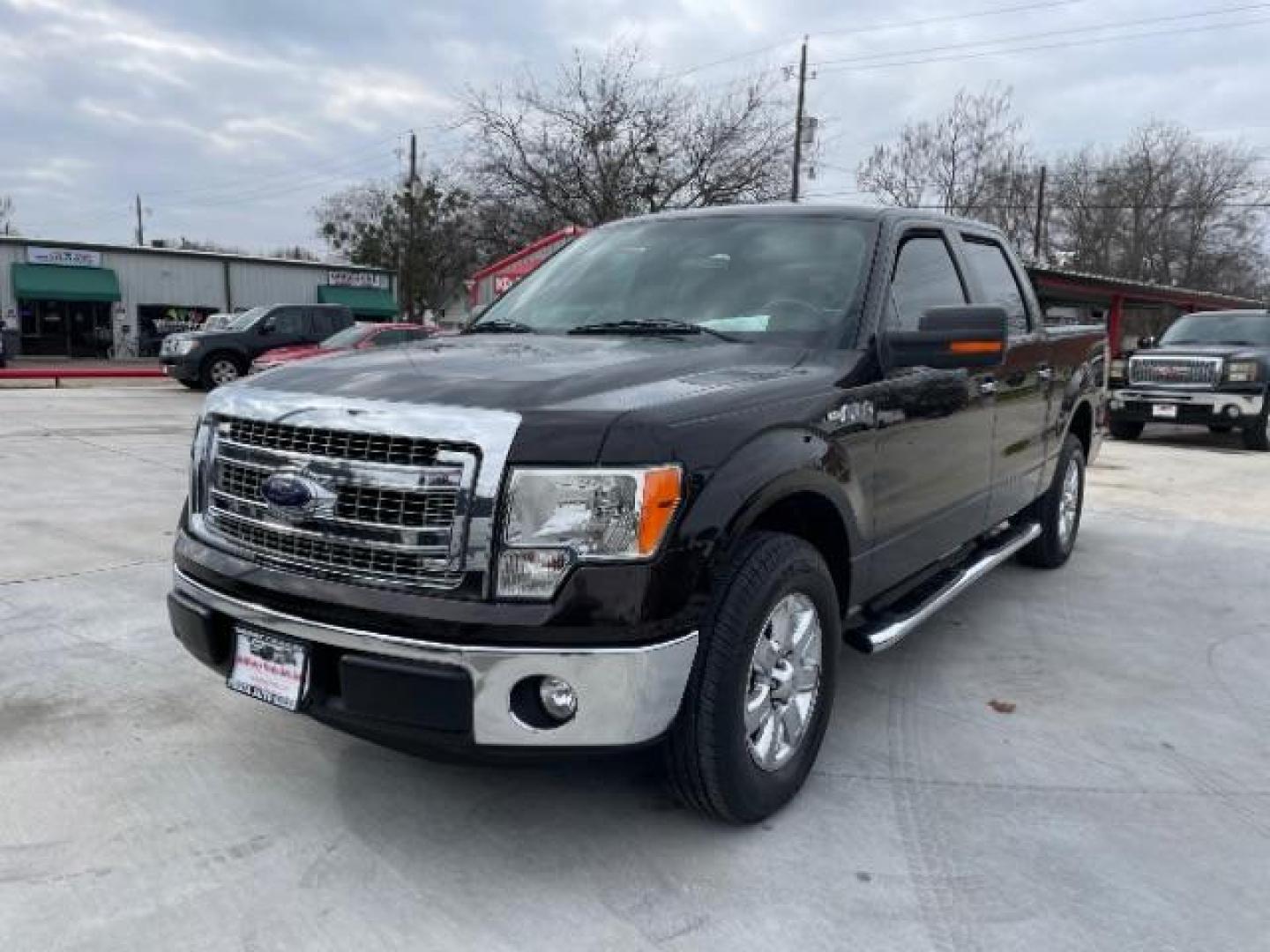 2013 Brown /Tan cloth Ford F-150 XLT SuperCrew 5.5-ft. Bed 2WD (1FTFW1CF1DF) with an 5.0L V8 engine, 6-Speed Automatic transmission, located at 900 South McDonald Street, McKinney, TX, 75069, (972) 529-2992, 33.189335, -96.613403 - Photo#2