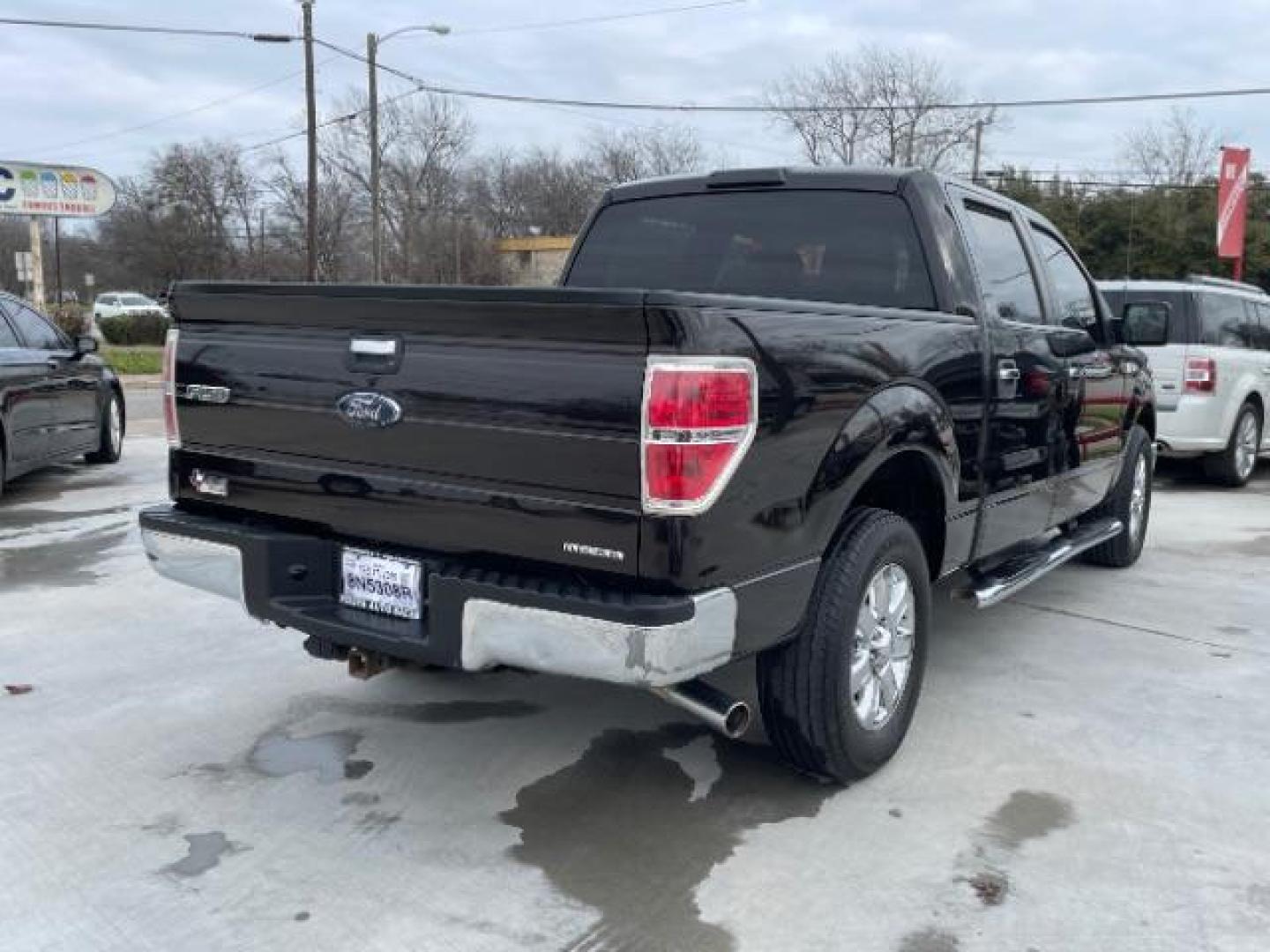 2013 Brown /Tan cloth Ford F-150 XLT SuperCrew 5.5-ft. Bed 2WD (1FTFW1CF1DF) with an 5.0L V8 engine, 6-Speed Automatic transmission, located at 900 South McDonald Street, McKinney, TX, 75069, (972) 529-2992, 33.189335, -96.613403 - Photo#4