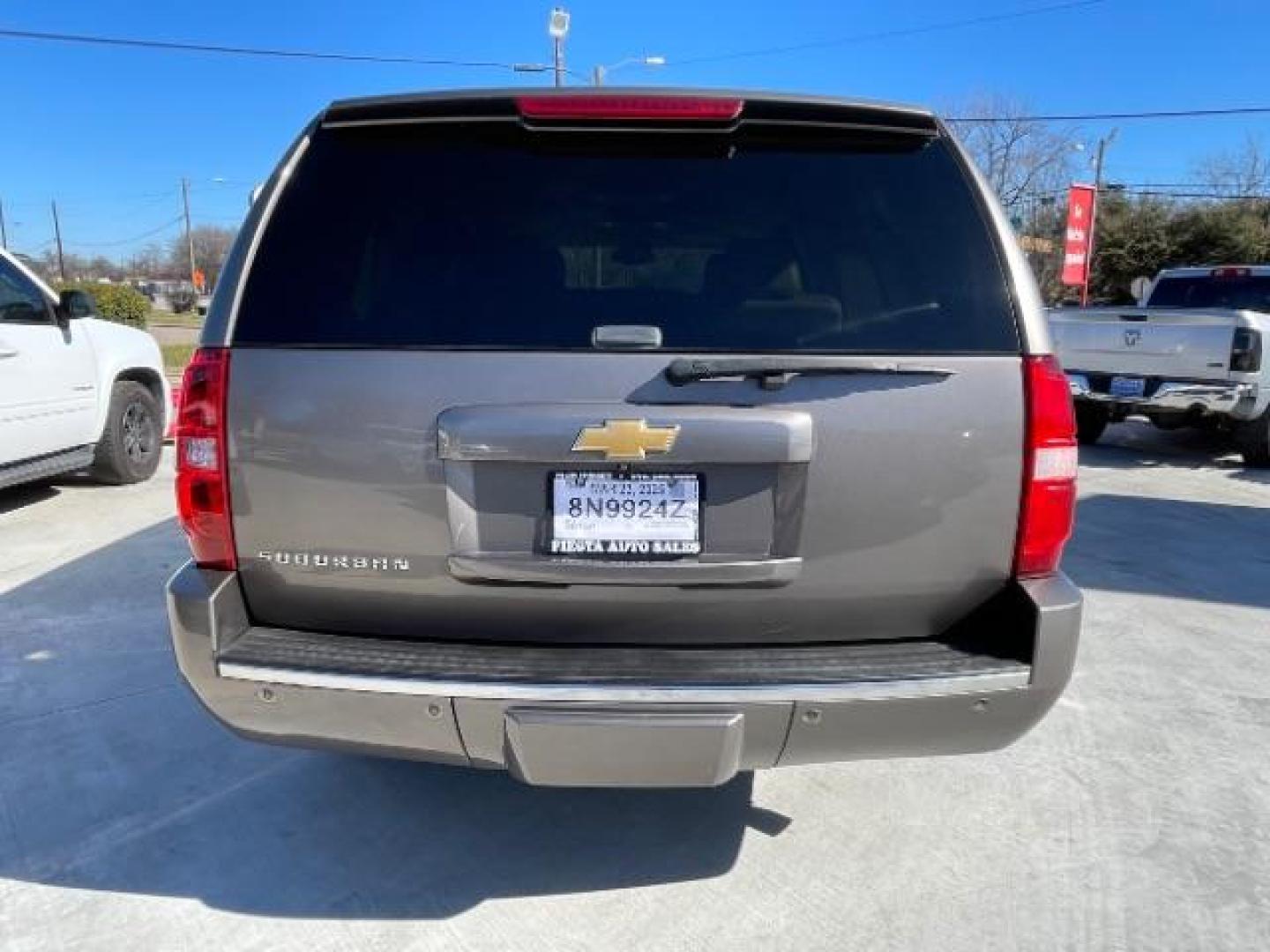 2013 Mocha Steel Metallic /Light Cashmere/Dark Cashmere Leather Interior Chevrolet Suburban LTZ 1500 2WD (1GNSCKE03DR) with an 5.3L V8 OHV 16V FFV engine, 6-Speed Automatic transmission, located at 900 South McDonald Street, McKinney, TX, 75069, (972) 529-2992, 33.189335, -96.613403 - Photo#7